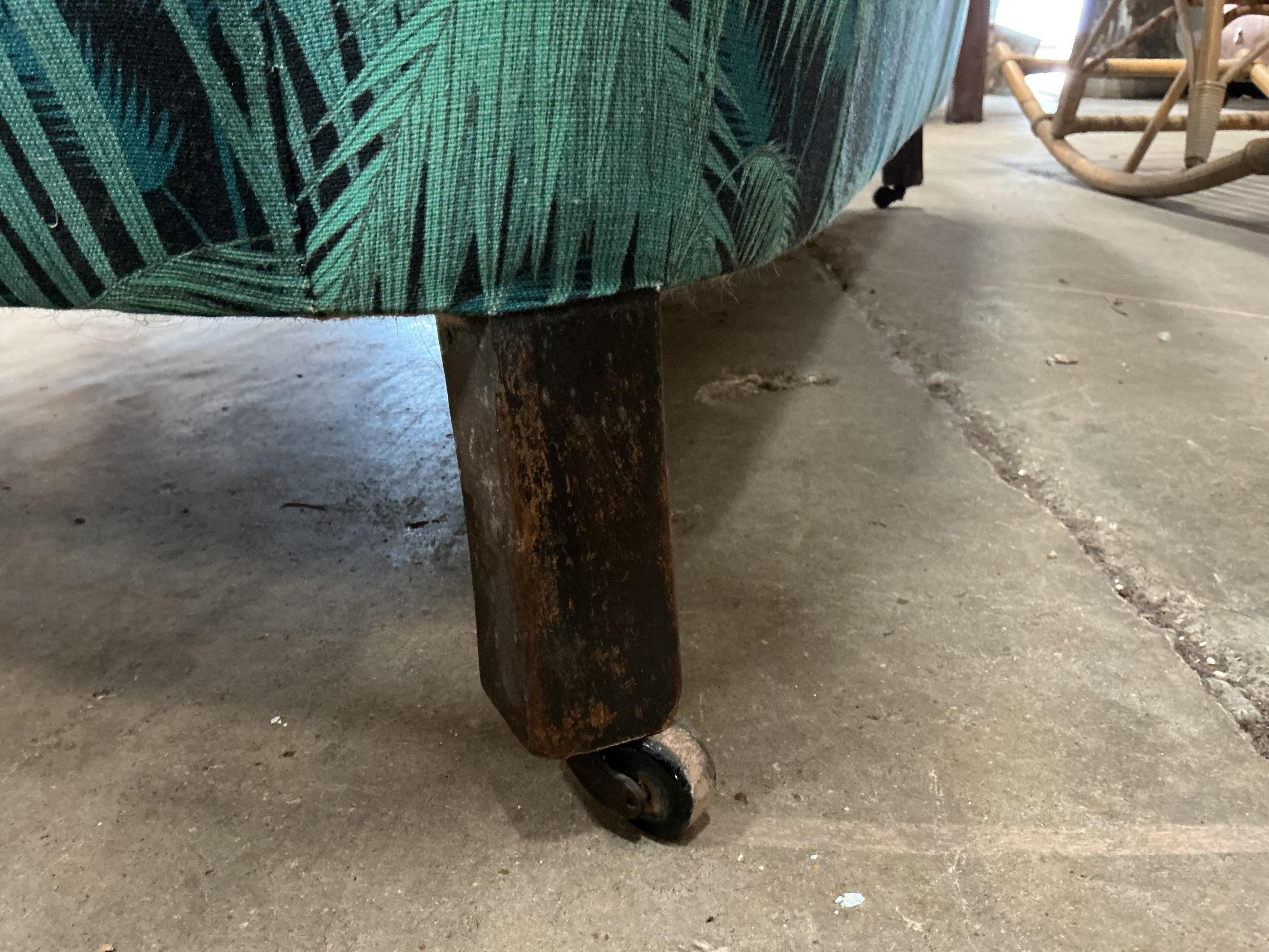 A late Victorian upholstered Chesterfield settee, width 190cm, depth 80cm, height 75cm